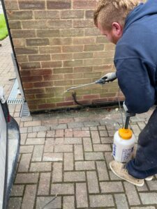 Waterproof sealant for exterior walls being applied by a Lakeside Flood Solutions specialist