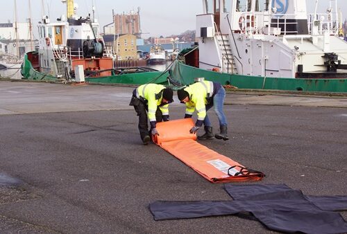 Temporary flood barriers installation by Lakeside