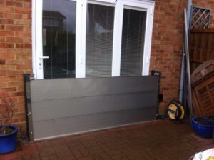 patio door being protected by doorway flood barrier
