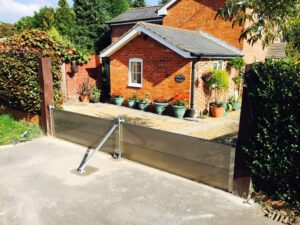 steel residential flood barrier protecting home from flooding