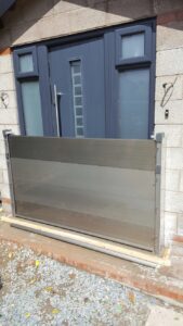 A front door protected by a Lakeside Flood Solutions flood barrier